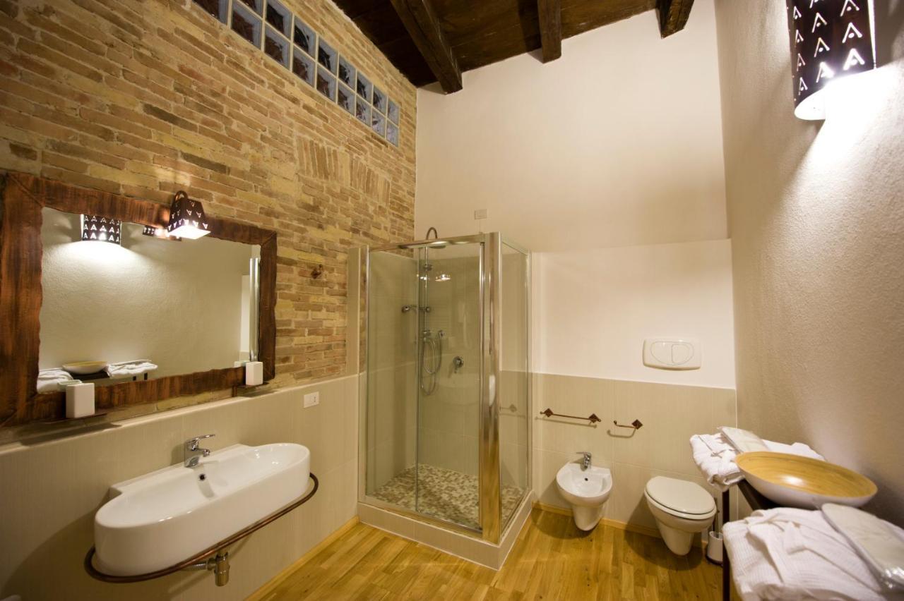 Castelletto Suites กาญารี ห้อง รูปภาพ
