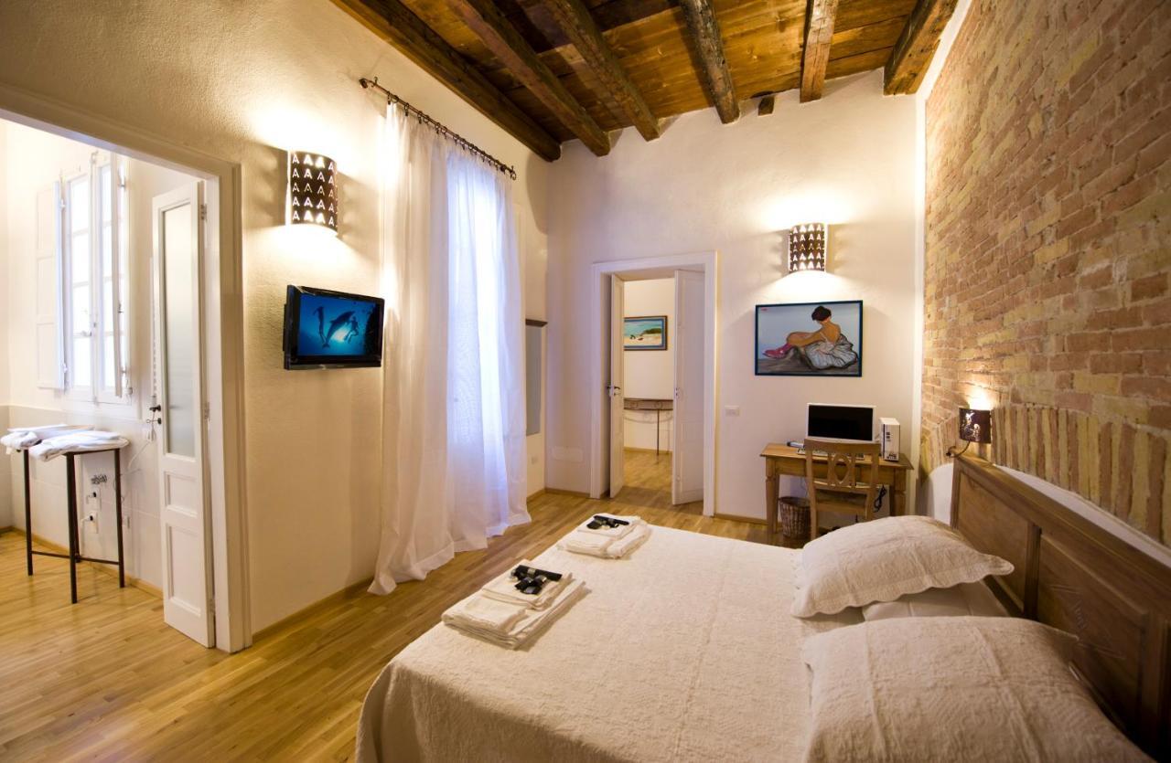 Castelletto Suites กาญารี ห้อง รูปภาพ